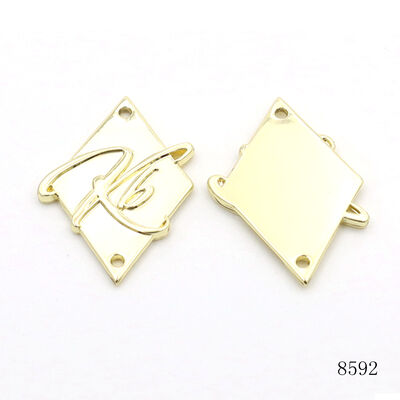 None Rusty Garment Leather Bag Design Metal Label Gold Plated Custom Metal Embossed Logo Plate with Sewing Holes