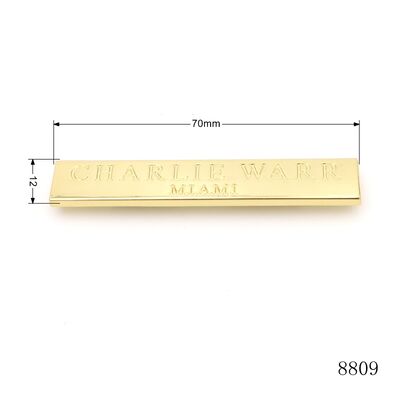 Custom embossed zinc alloy metal logo plate gold rectangular bag name label with back prongs for leather handbag hardware