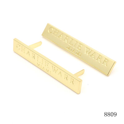 Custom embossed zinc alloy metal logo plate gold rectangular bag name label with back prongs for leather handbag hardware